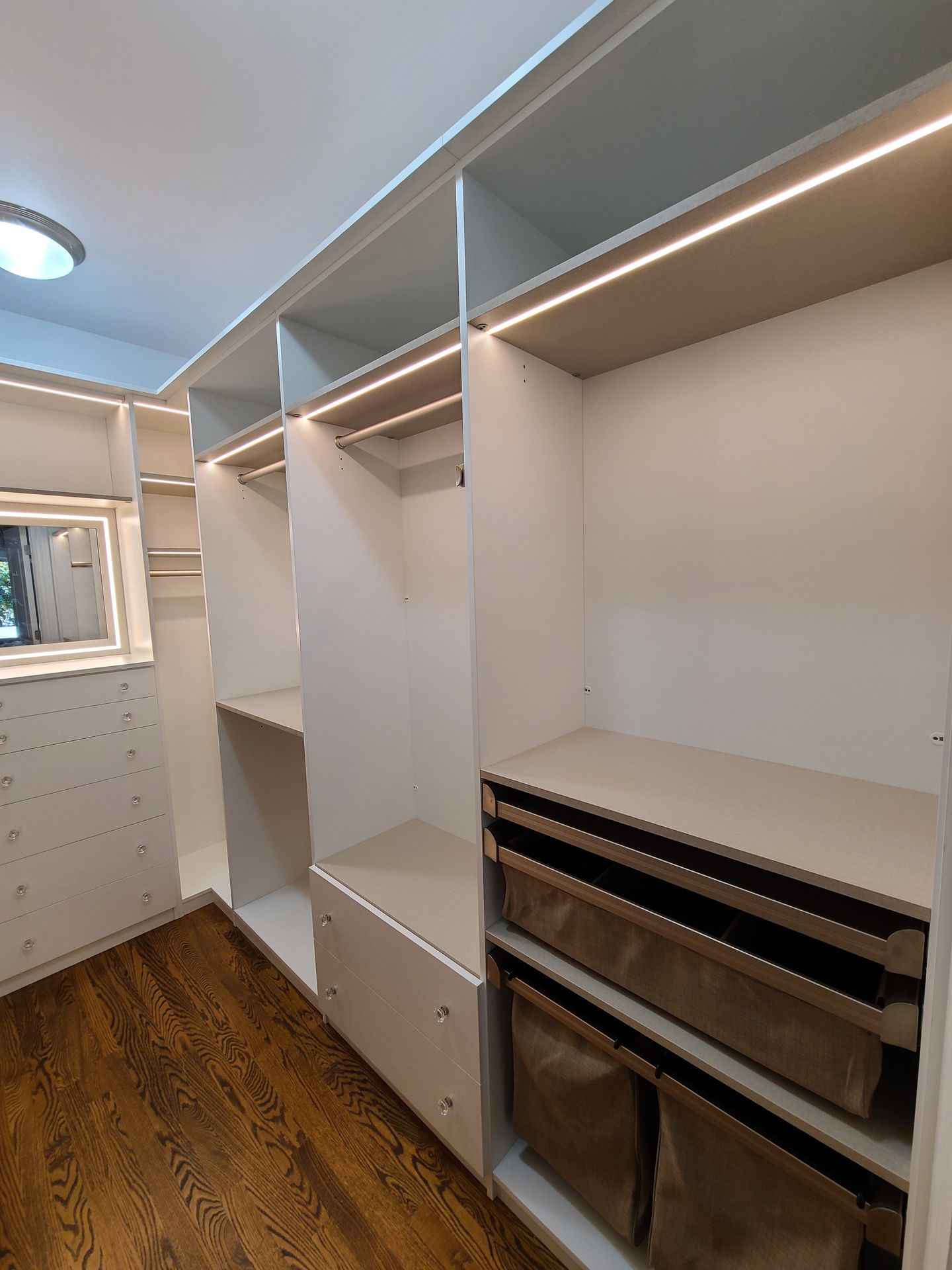 Custom Walk-in Closet with lights in Calgary